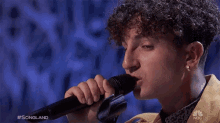 singing performing holding mic curly hair songland singing performing holding mic curly hair songland