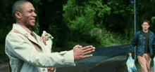 Shaking Hands With A Car - Hitchhiker'S Guide To The Galaxy GIF - Hitchhikers Guide To The Galaxy Martin Freeman GIFs