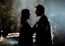 Kissing Kissing In The Rain GIF - Kissing Kissing In The Rain Damon Salvatore GIFs