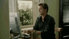 Jim Carrey Typing GIF - Jim Carrey Typing Bruce Almighty GIFs