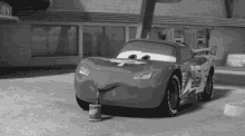 black and white cars sipping drink lightning mcqueen