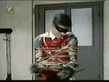 Tied Up GIF - Robin Trapped Vintage GIFs