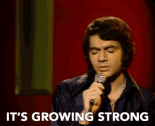 Its Growing Strong Neil Diamond GIF - Its Growing Strong Neil Diamond Sweet Caroline GIFs