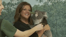 Abby Lee Miller Eating GIF - Abby Lee Miller Eating Koala GIFs