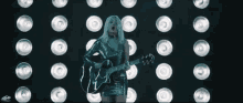 performing alexi blue young and reckless acoustic guitar music