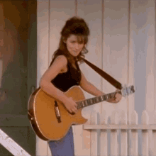 Playing Guitar Shania Twain GIF - Playing Guitar Shania Twain Whose Bed Have Your Boots Been Under GIFs