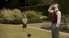 Charles Kicks A Football At Philip GIF - The Crown Netflix Phillip Duke Of Edinburgh GIFs