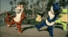 Mascots Two Step GIF - Two Step Two Step Dance Characters Dancing GIFs