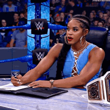 Bianca Belair Signing GIF - Bianca Belair Signing Signs GIFs