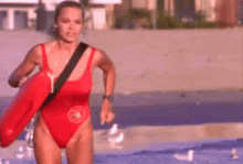Baywatch GIF - Pamela Anderson Life Guard Run GIFs