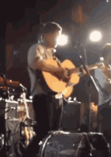 Marcus Mumford And Sons GIF - Marcus Mumford And Sons Guitar GIFs