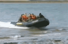 Overboard On To The Beach GIF - Beach Overboard Boat GIFs