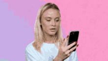 What Confused GIF - What Confused Checking Phone GIFs