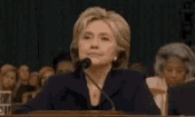 Hillary Clinton Brush GIF - Hillary Clinton Brush Shoulders GIFs
