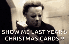 Michael Myers Show Me GIF - Michael Myers Show Me Christmas Cards GIFs