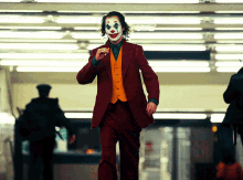Smoke Joker GIF - Smoke Joker Cigarette GIFs