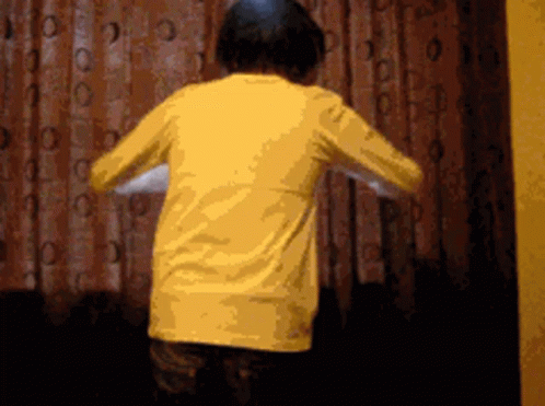 a gif of a person opening curtains in darkness and then being blinded to the light