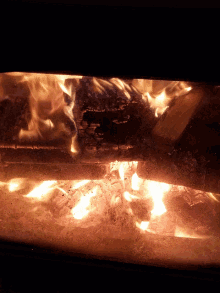 fire place chimenea chunk of wood fire hot