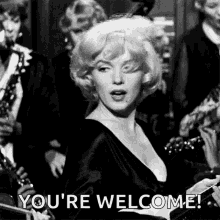 Marilyn Monroe Wink GIF - Marilyn Monroe Wink Youre Welcome GIFs