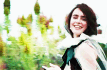 Lily Collins Wave GIF - Lily Collins Wave Bye GIFs