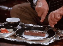 Nothing Like A Snickers For Dessert GIF - Snickers Chocolate Meal GIFs
