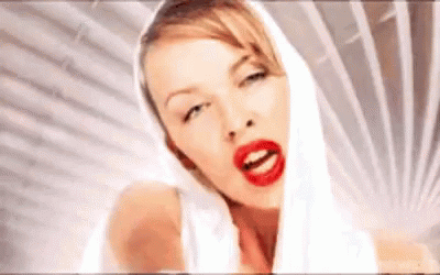 Kylie Minogue Singing GIF - Kylie Minogue Singing Music Video - Discover &  Share GIFs