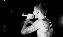 Mgk Mgk On Stage GIF - Mgk Mgk On Stage Mgk Stage Jumping And Surfing GIFs