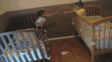 Clever Toddlers GIF - Toddlers Pulling Brother GIFs