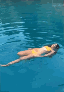 swimming ela kir bikini floating