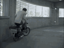 Hasselhoff Moped Rider GIF - Hasselhoff Moped Rider Try Hard GIFs