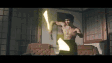 Bruce Lee Lightsaber GIF - Bruce Lee Lightsaber Martial Arts GIFs