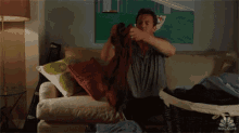 Doing Laundry For Two Is The Absolute Worst. GIF - Laundry Laundry For Two Fold GIFs