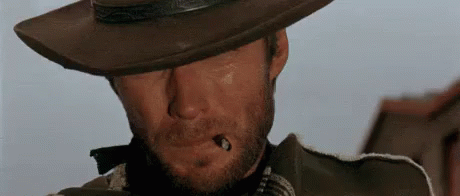 Smoking Cowboy GIF - The Good The Bad And The Ugly Clint Eastwood Man With No Name GIFs