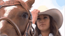 Cowgirl And Horse GIF - Cowgirl Horse Cowboy Hat GIFs