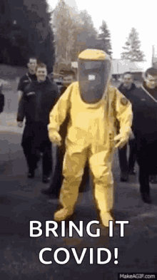 Bring It Covid Protective Suit GIF - Bring It Covid Protective Suit Hyped Up GIFs