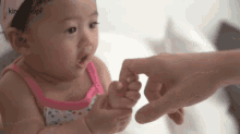 baby fingers hand baby girl amazed baby fingers hand baby girl amazed