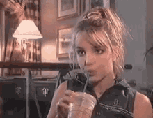 Britney Spears Starbucks GIF - Britney Spears Starbucks Bored GIFs
