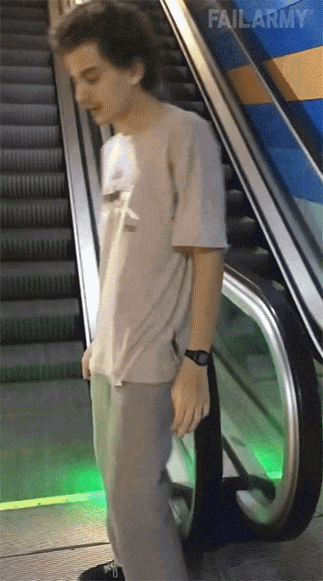 escalator-fail-goofing-around.gif