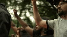 Raising My Arm Bobby Sessions GIF - Raising My Arm Bobby Sessions The Hate U Give Song GIFs