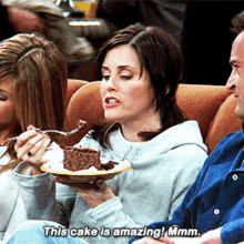Friends Monica Geller GIF - Friends Monica Geller This Cake Is Amazing Mmm GIFs
