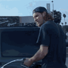 Douse In Gasoline Tim Commerford GIF - Douse In Gasoline Tim Commerford Rage Against The Machine GIFs