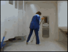 Mopping Floors Cleaning Lady GIF - Mopping Floors Cleaning Lady Washroom Stalls GIFs