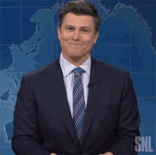 Holding In Laughter Colin Jost GIF - Holding In Laughter Colin Jost Saturday Night Live GIFs