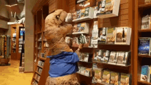 T-rex Taking Inventory GIF - Inventory Taking Inventory Checking Inventory GIFs