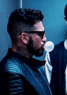 Baby Driver Goons GIF - Baby Driver Goons Blowing Bubbles GIFs