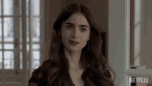 Blinking Emily Cooper GIF - Blinking Emily Cooper Lily Collins GIFs
