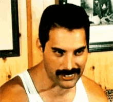 Freddie Mercury Laugh GIF - Freddie Mercury Freddie Mercury GIFs