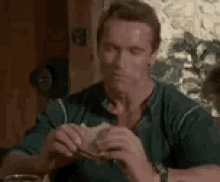 Arnold Schwarzenegger Eating GIF - Arnold Schwarzenegger Eating GIFs