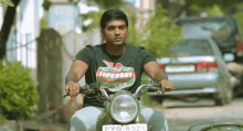 riding wobbly ride motorcycle naanum rowdy dhaan