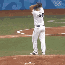 throwing the ball international olympic committee korea vs cuba baseball olympics